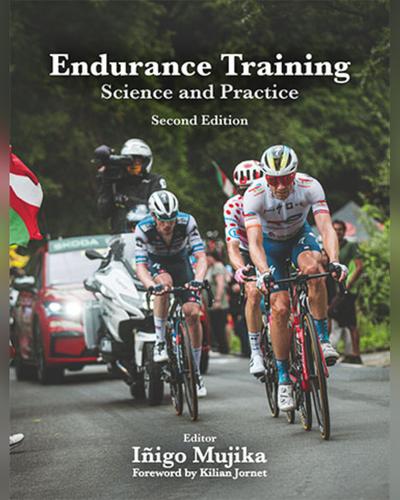 Cover of Endurance Training: Science and Practice, second edition, edited by Iñigo Mujika, with a photo of cyclists racing uphill past a crowd.