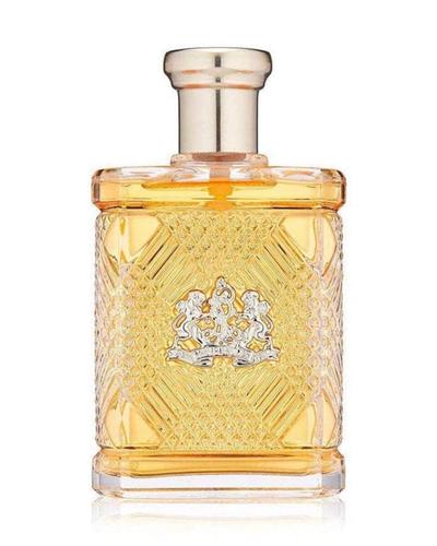 A faceted amber glass bottle of Ralph Lauren Safari for Men eau de toilette with a silver crest and a rose-gold cap.